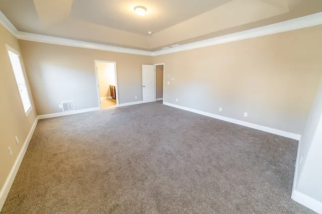 a spacious bathroom with a double vanity sink mirror and double