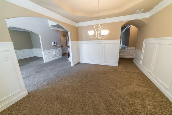 a view of a hallway view with staircase