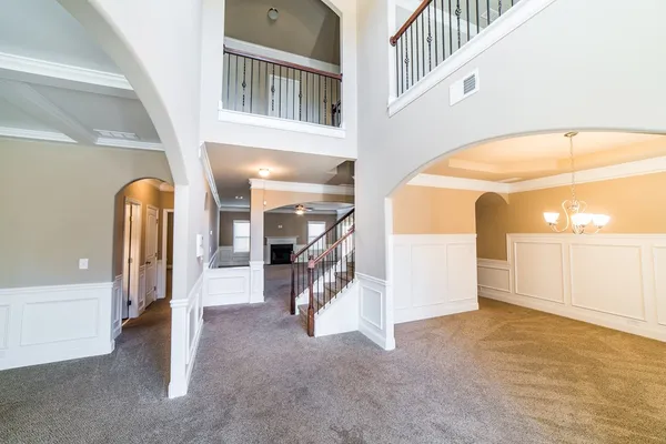 an empty room with windows