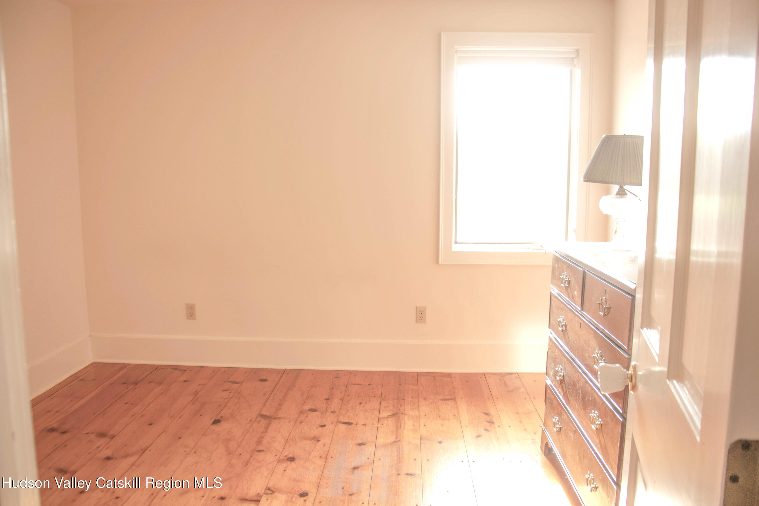 96 Jefferson Hill Road Chatham, NY 12115 - Photo 8 of 17 a view of an empty room and window