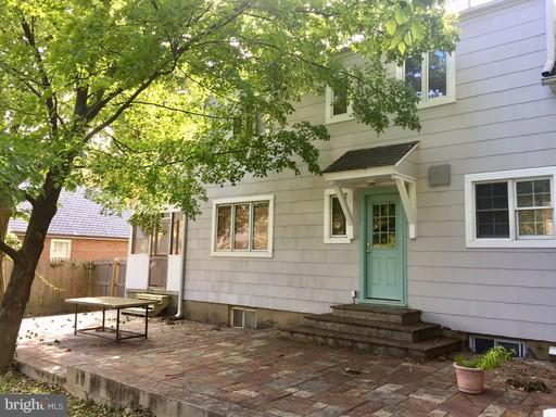 8905 Flower Avenue Silver Spring, MD 20901 - Photo 15 of 17 a view of a outdoor with a chairs and table in a house