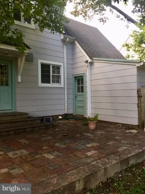 8905 Flower Avenue Silver Spring, MD 20901 - Photo 17 of 17 a front view of a house with a yard