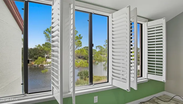 $290,000 | 8730 Thomas Drive, Unit 113, Panama City Beach, FL 32408