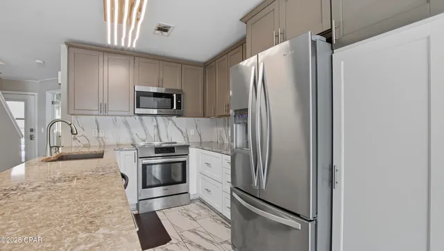 $290,000 | 8730 Thomas Drive, Unit 113, Panama City Beach, FL 32408