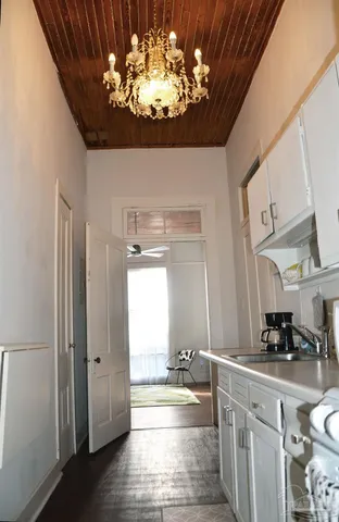 a kitchen with a sink and cabinets