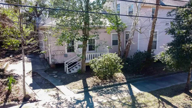 a backyard of a house with lots of green space