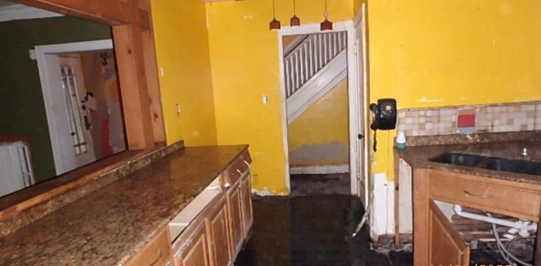 8217 South Rhodes Avenue Chicago, IL 60619 - Photo 12 of 22 a balcony view with a kitchen