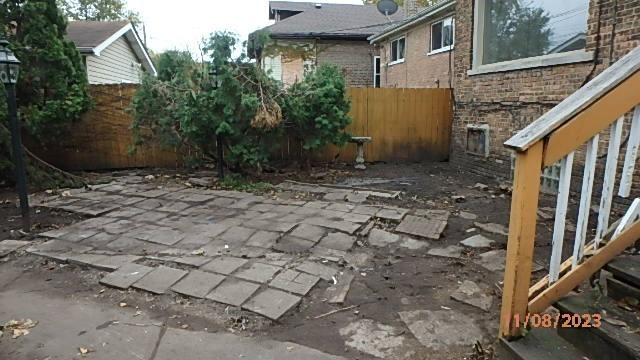 8217 South Rhodes Avenue Chicago, IL 60619 - Photo 19 of 22 a backyard of a house