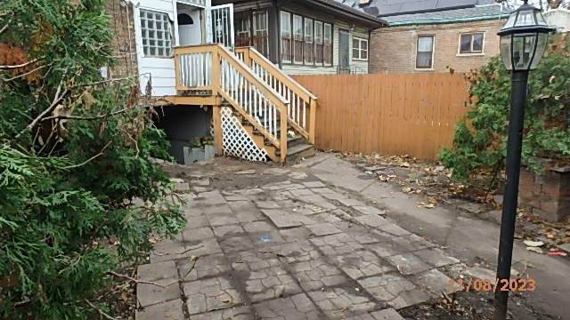 8217 South Rhodes Avenue Chicago, IL 60619 - Photo 20 of 22 a view of entryway with a yard