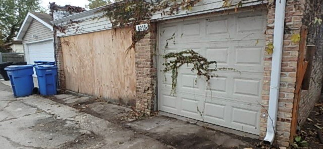 8217 South Rhodes Avenue Chicago, IL 60619 - Photo 22 of 22 a view of front door and a yard