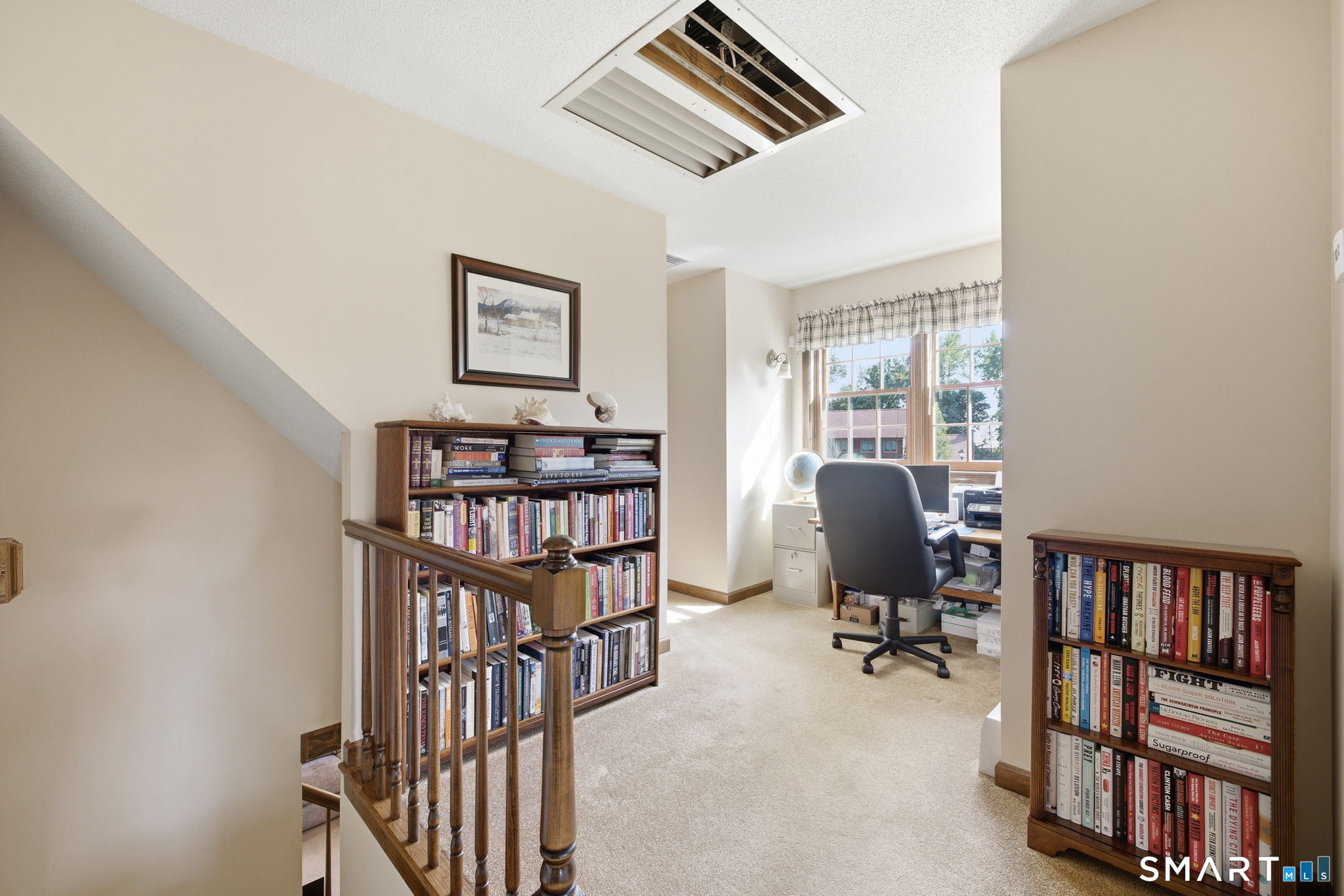 26 Devine Road Suffield, CT 06078 - Photo 35 of 40 This 10'x8' loft area makes for a great reading nook or office space