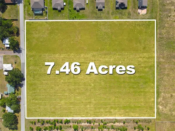 a view of swimming pool with a yard