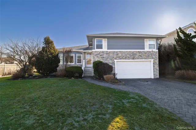 a view of house with yard