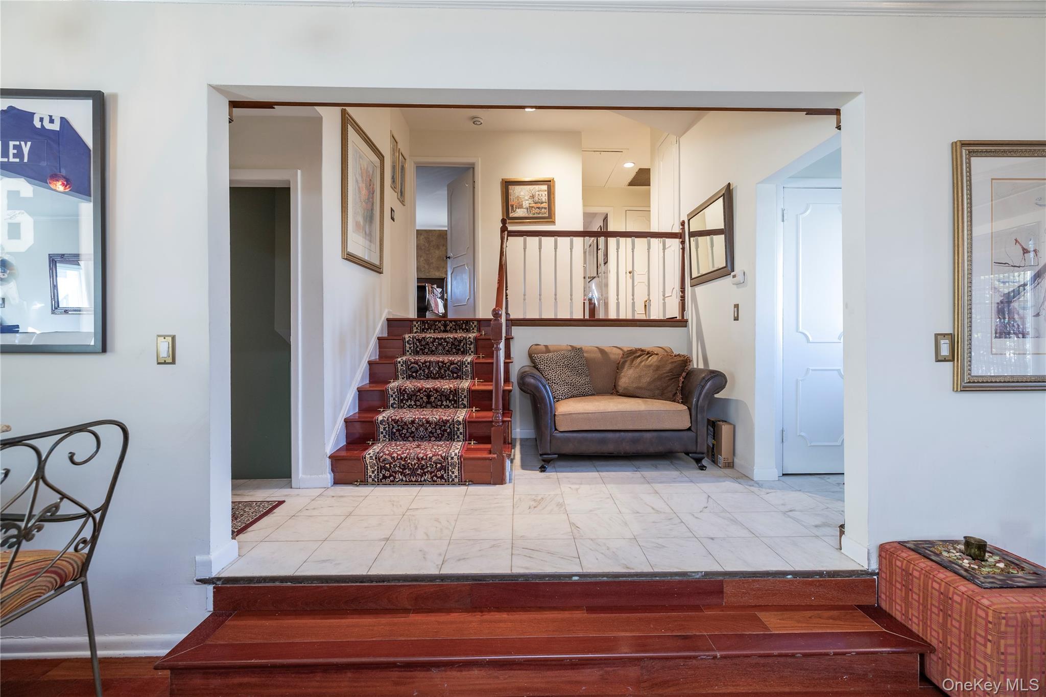 136 Greenway Road Lido Beach, NY 11561 - Photo 12 of 29 a living room with furniture and a rug