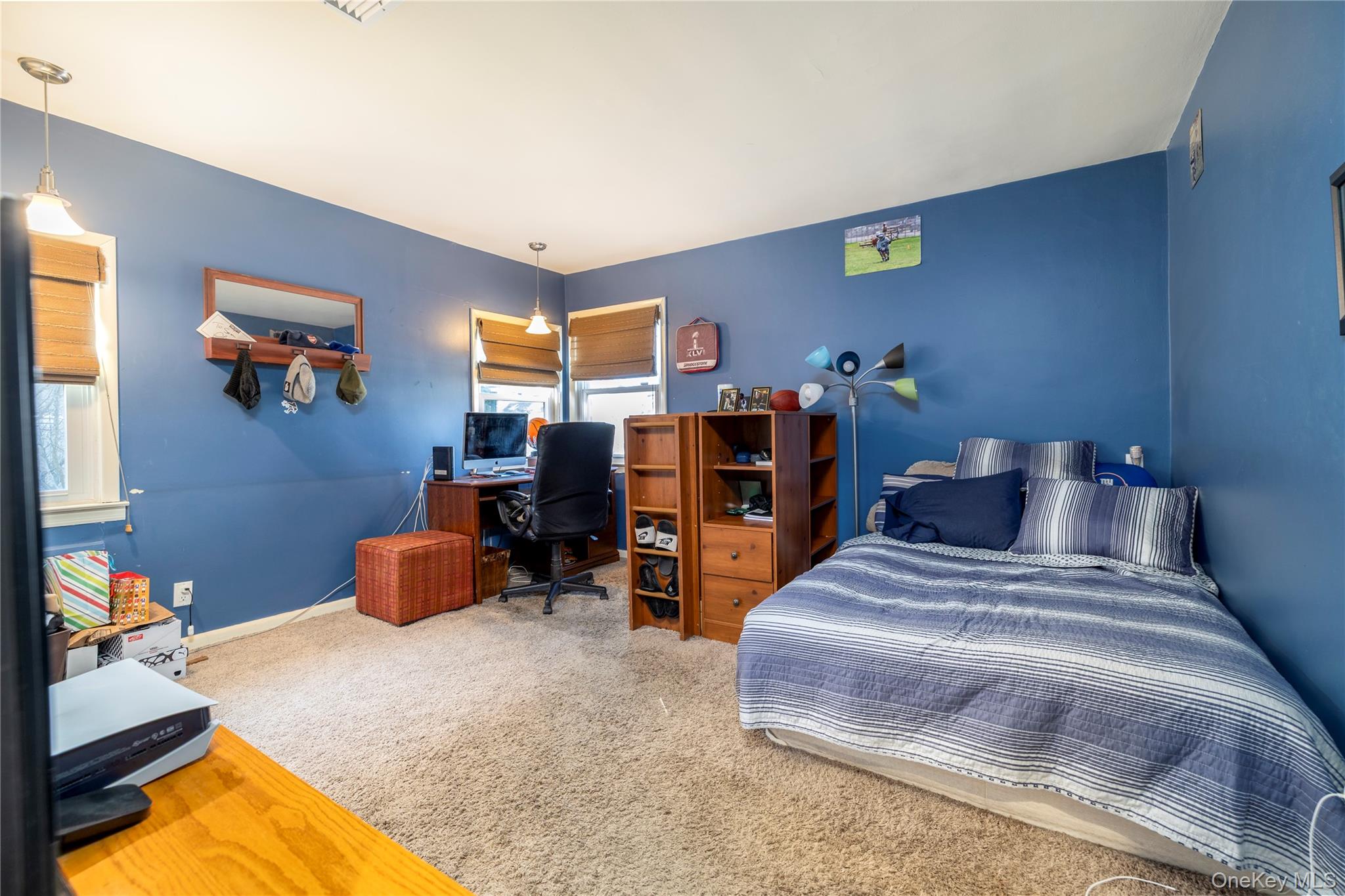 136 Greenway Road Lido Beach, NY 11561 - Photo 15 of 29 a bedroom with bed and window