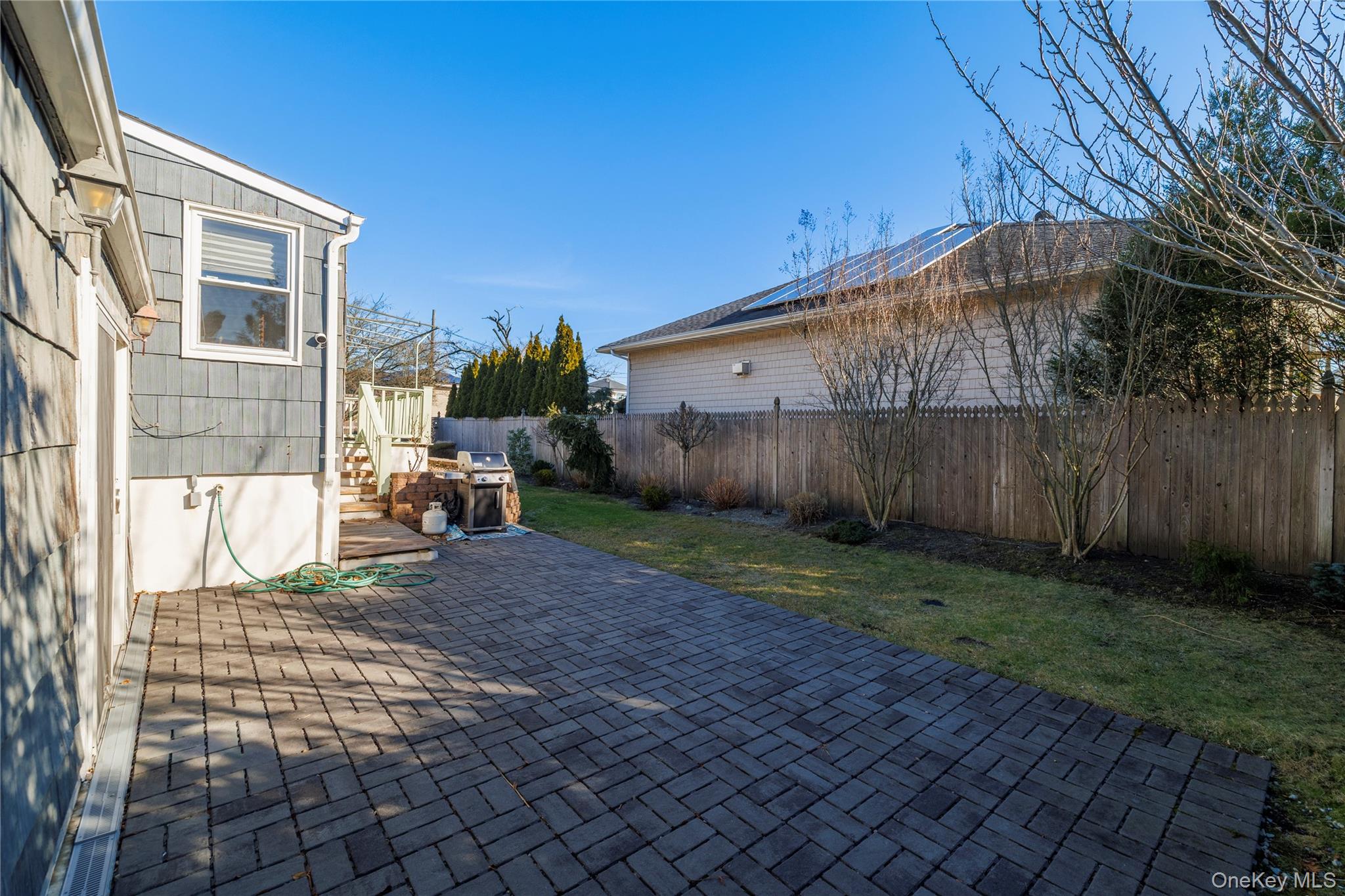 136 Greenway Road Lido Beach, NY 11561 - Photo 20 of 29 a backyard of a house