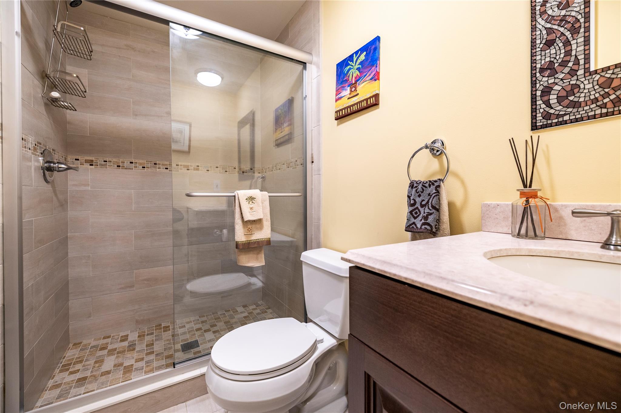 136 Greenway Road Lido Beach, NY 11561 - Photo 21 of 29 a bathroom with a sink a toilet and shower