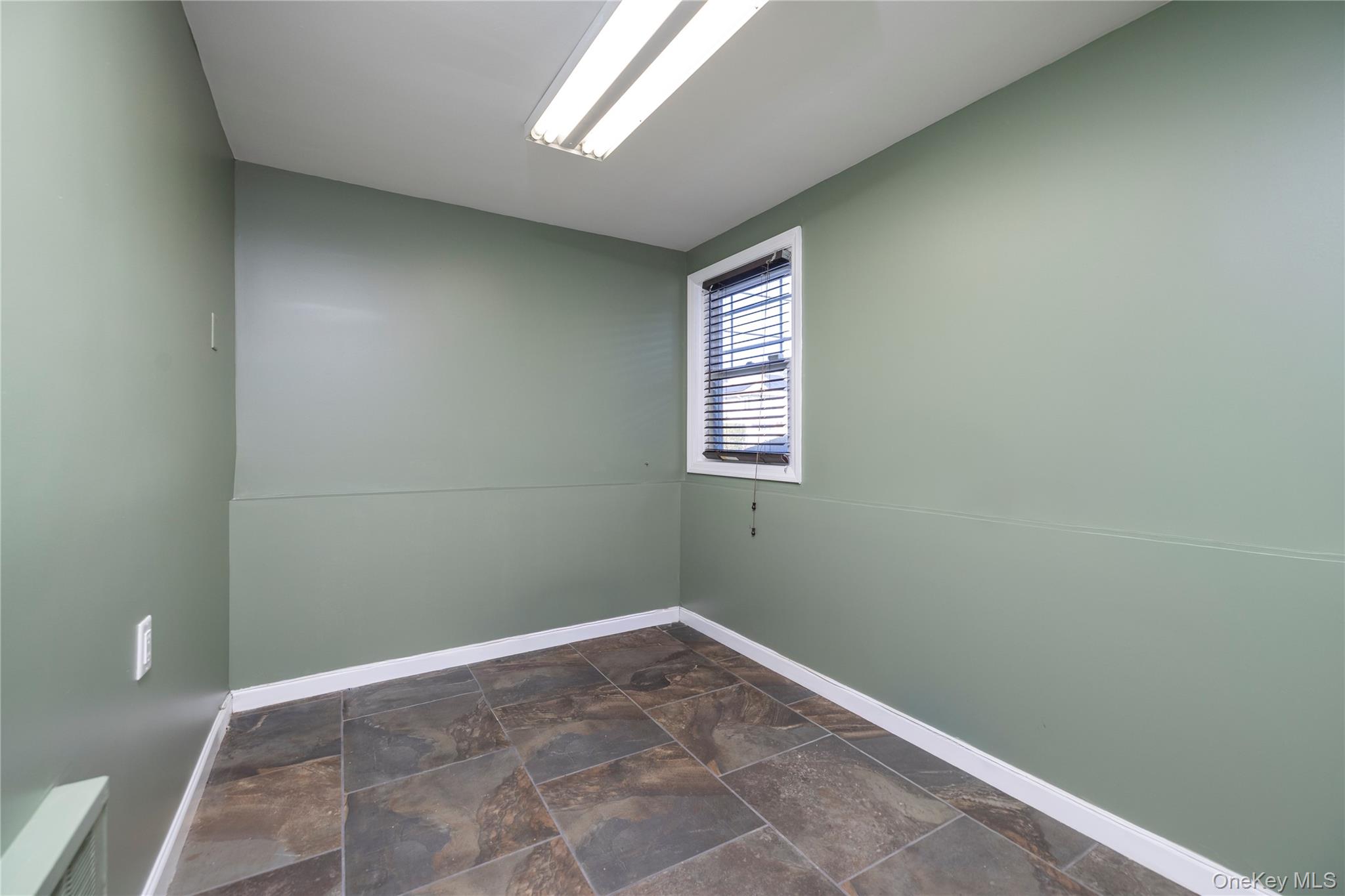 136 Greenway Road Lido Beach, NY 11561 - Photo 23 of 29 a view of an empty room and a window