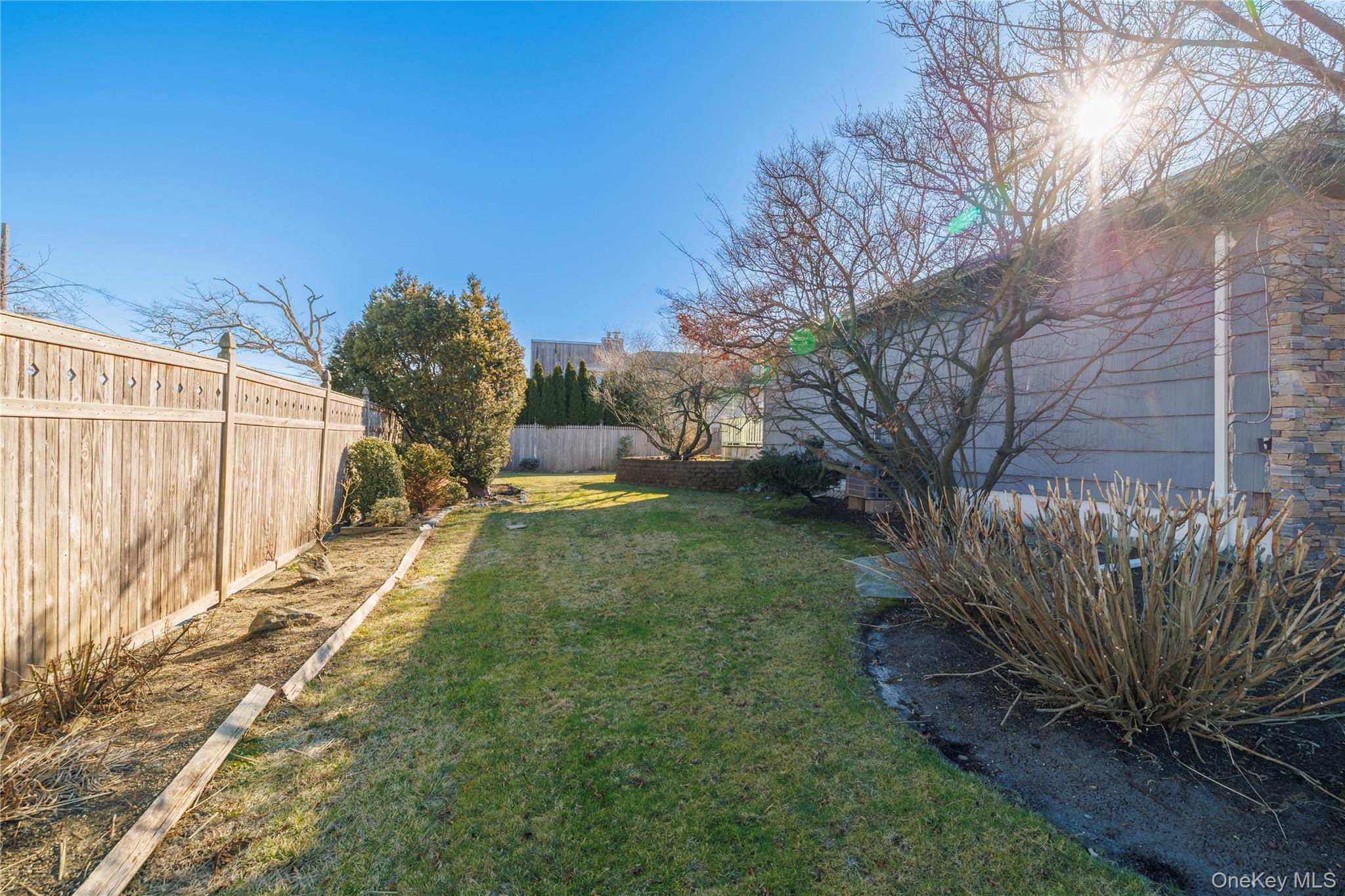 136 Greenway Road Lido Beach, NY 11561 - Photo 25 of 29 a view of a backyard