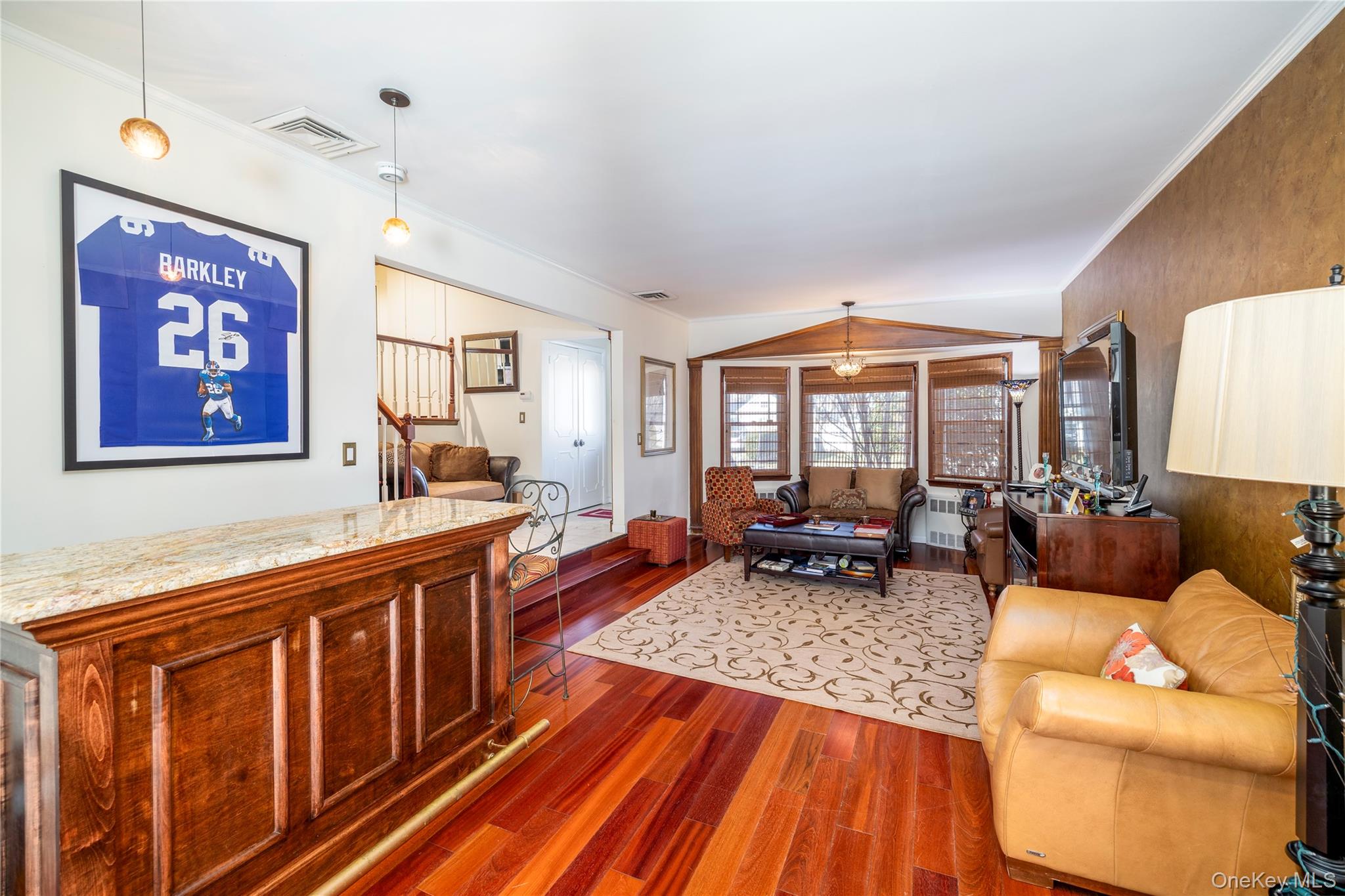 136 Greenway Road Lido Beach, NY 11561 - Photo 4 of 29 a living room with furniture a couch and large window