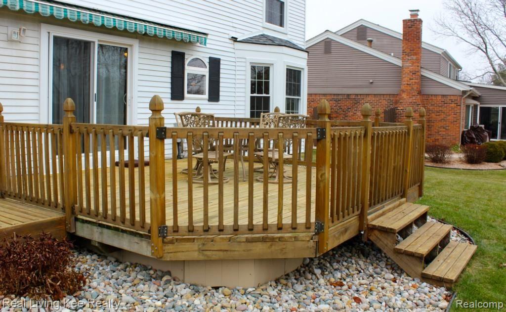 2275 Chippenham Chase Rochester, MI 48306 - Photo 21 of 21 Wood deck, low maintenance landscape, retractable awning.