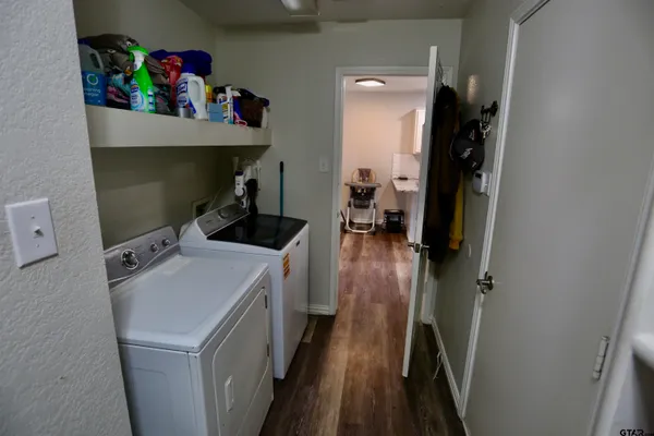 a utility room with dryer and washer