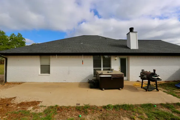 a front view of a house with yard