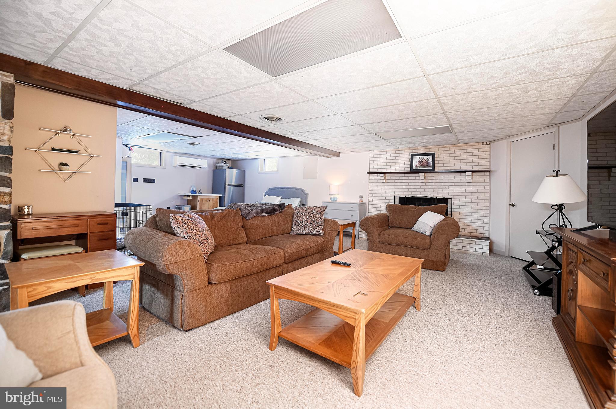 718 Chestnut Hill Road Forest Hill, MD 21050 - Photo 24 of 34 Lower Level Family Room w/ Gas Fireplace (AS IS)