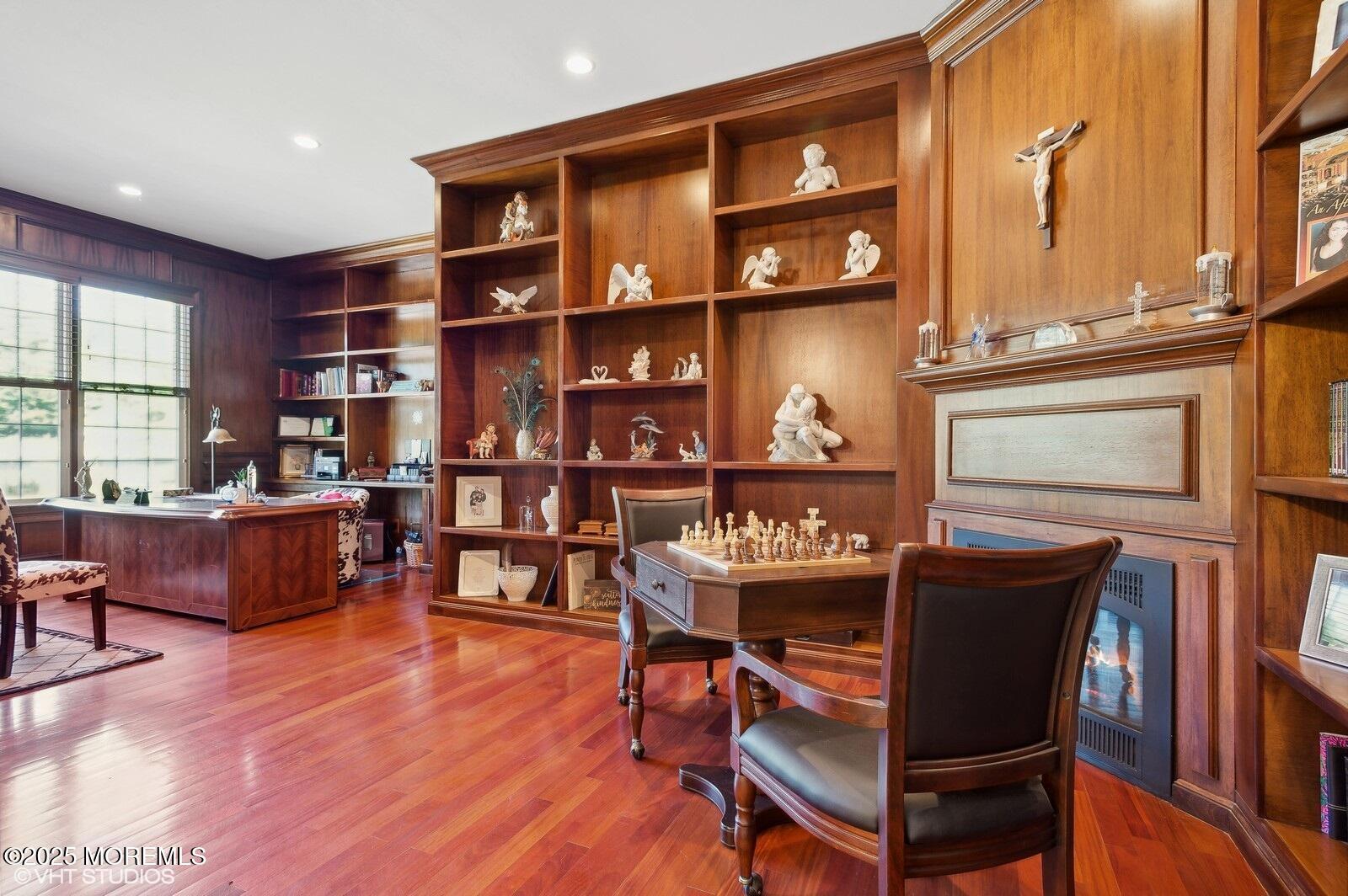 100 Richdale Road Colts Neck, NJ 07722 - Photo 11 of 31 a dining room with a wooden table and chairs