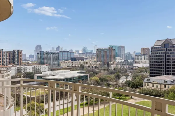a view of a city with tall buildings