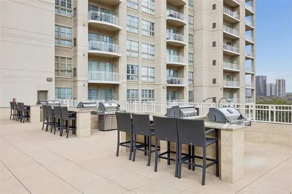 a view of dinning table and chairs in the patio