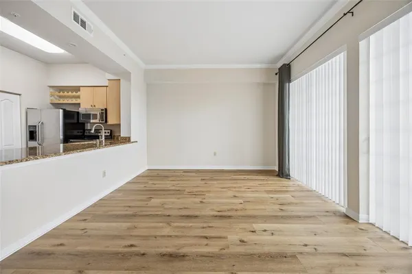 a view of an empty room and window