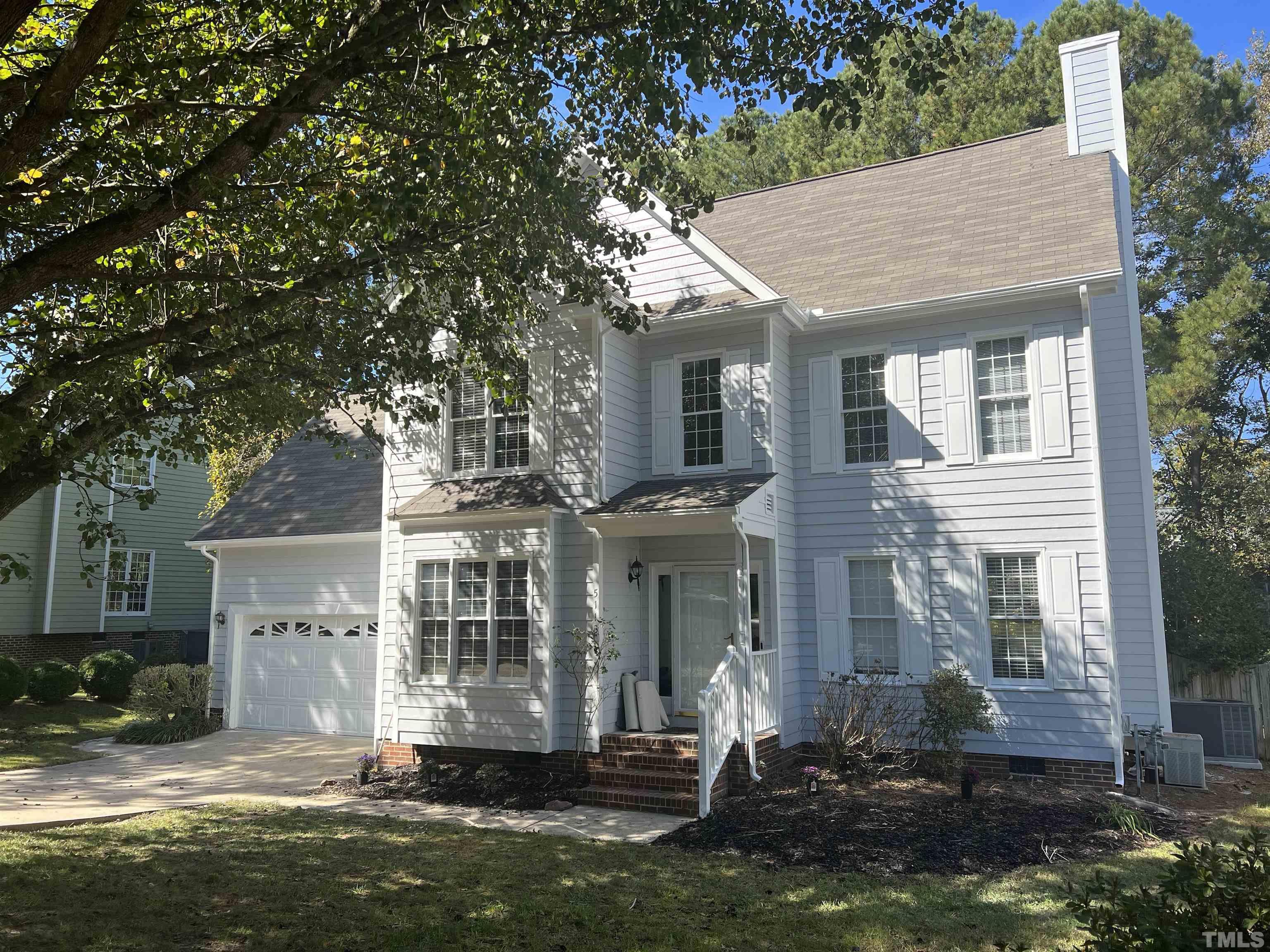 5113 Six Point Trail Raleigh, NC 27616 - Photo 15 of 53 front view of a house with a yard