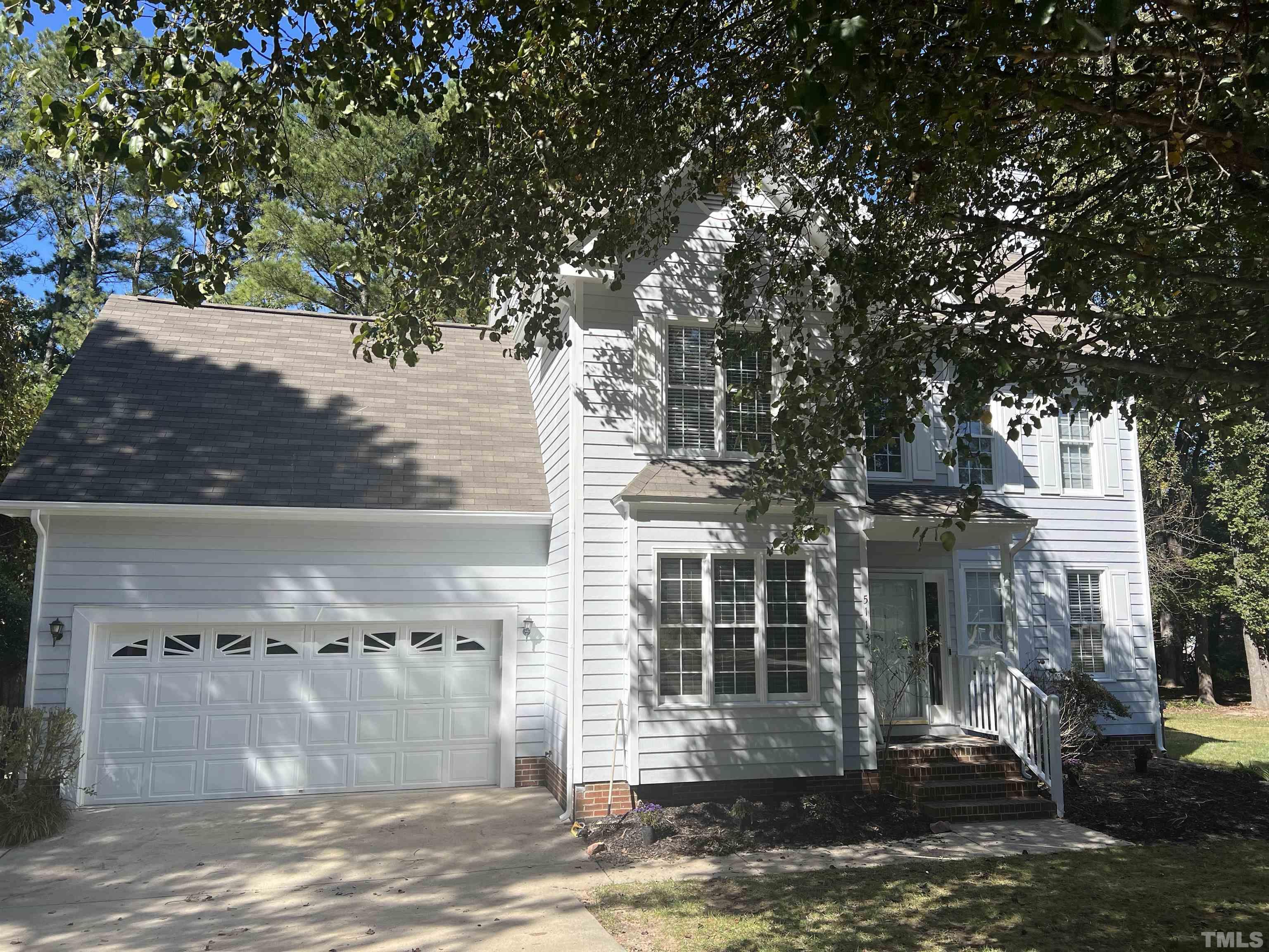 5113 Six Point Trail Raleigh, NC 27616 - Photo 16 of 53 a front view of a house with a yard