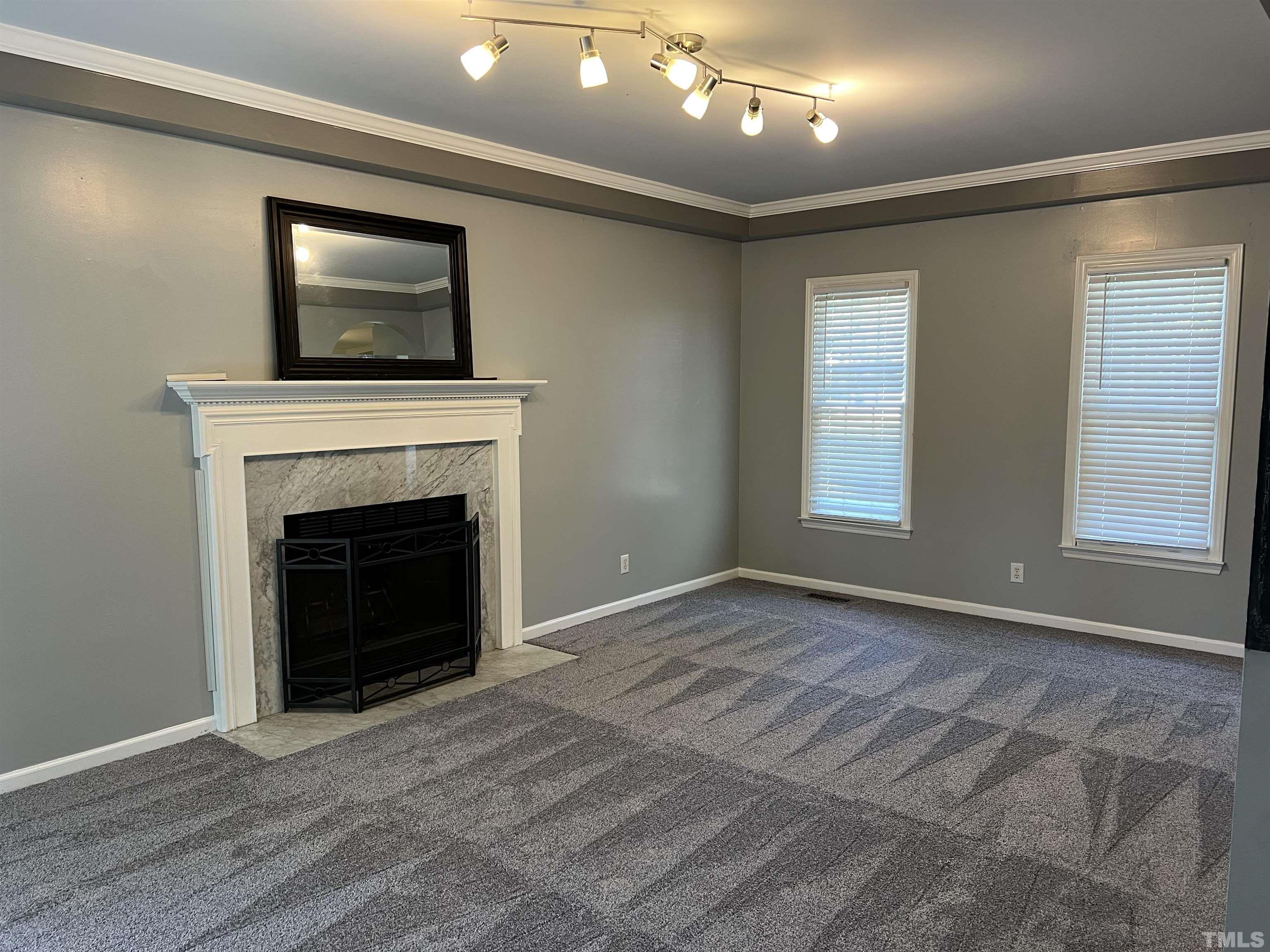 5113 Six Point Trail Raleigh, NC 27616 - Photo 20 of 53 a view of an empty room with window and fireplace