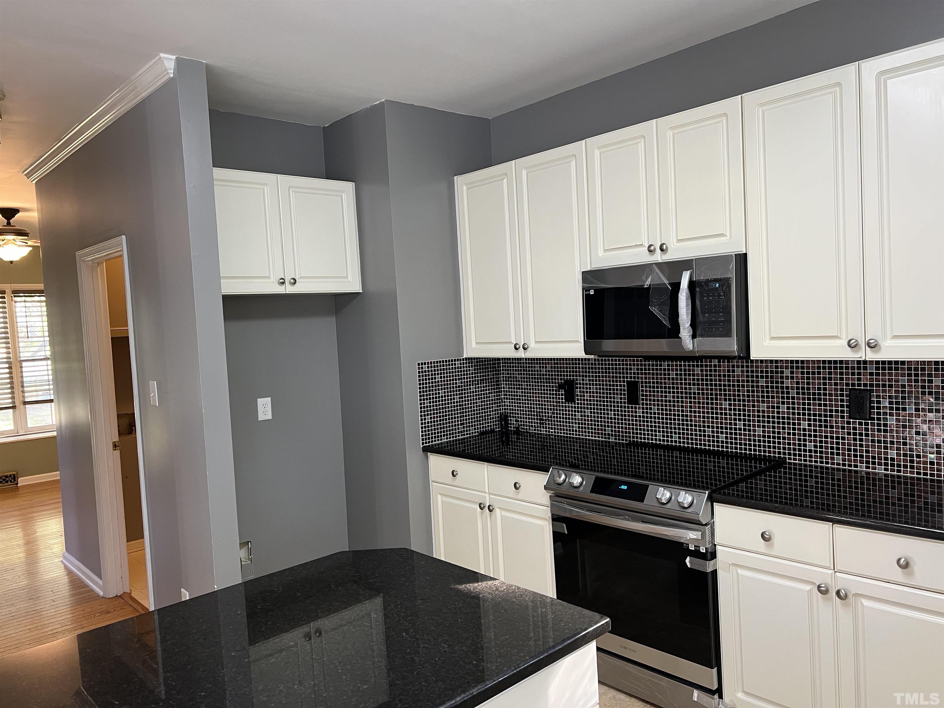 5113 Six Point Trail Raleigh, NC 27616 - Photo 27 of 53 a kitchen with a sink and a stove top oven