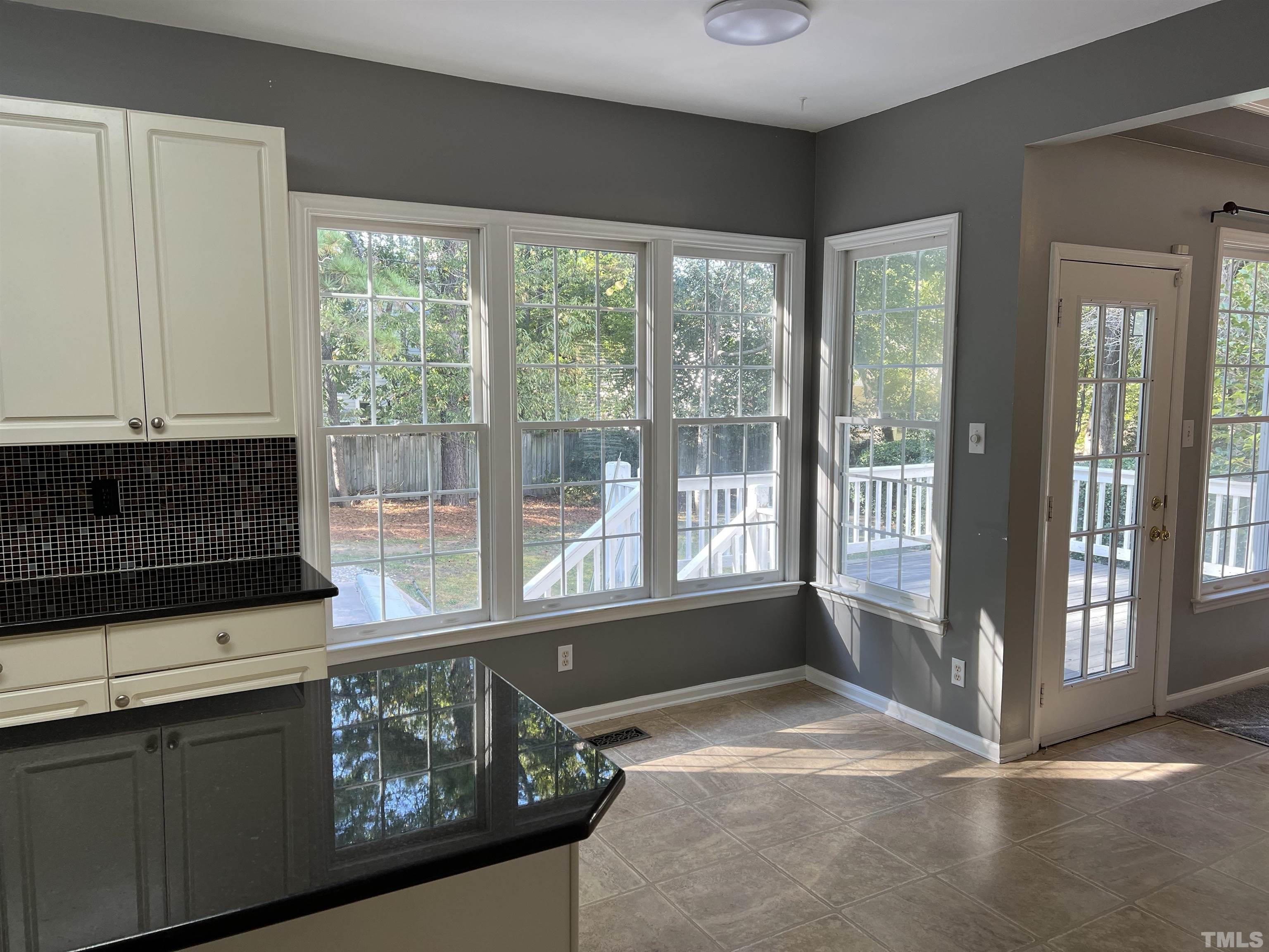 5113 Six Point Trail Raleigh, NC 27616 - Photo 28 of 53 a view of a kitchen with microwave and refrigerator