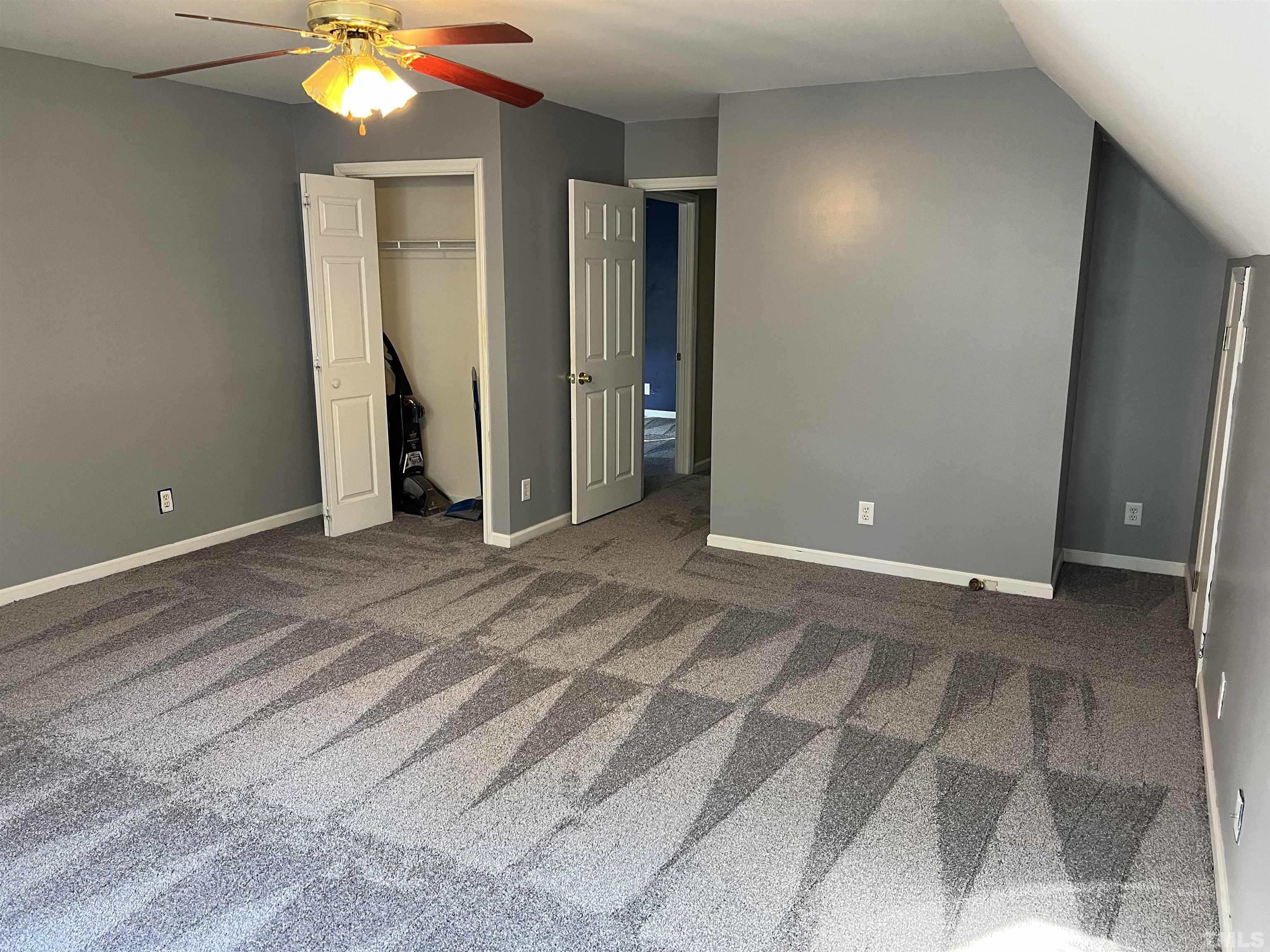 5113 Six Point Trail Raleigh, NC 27616 - Photo 36 of 53 a view of an empty room with a chandelier fan