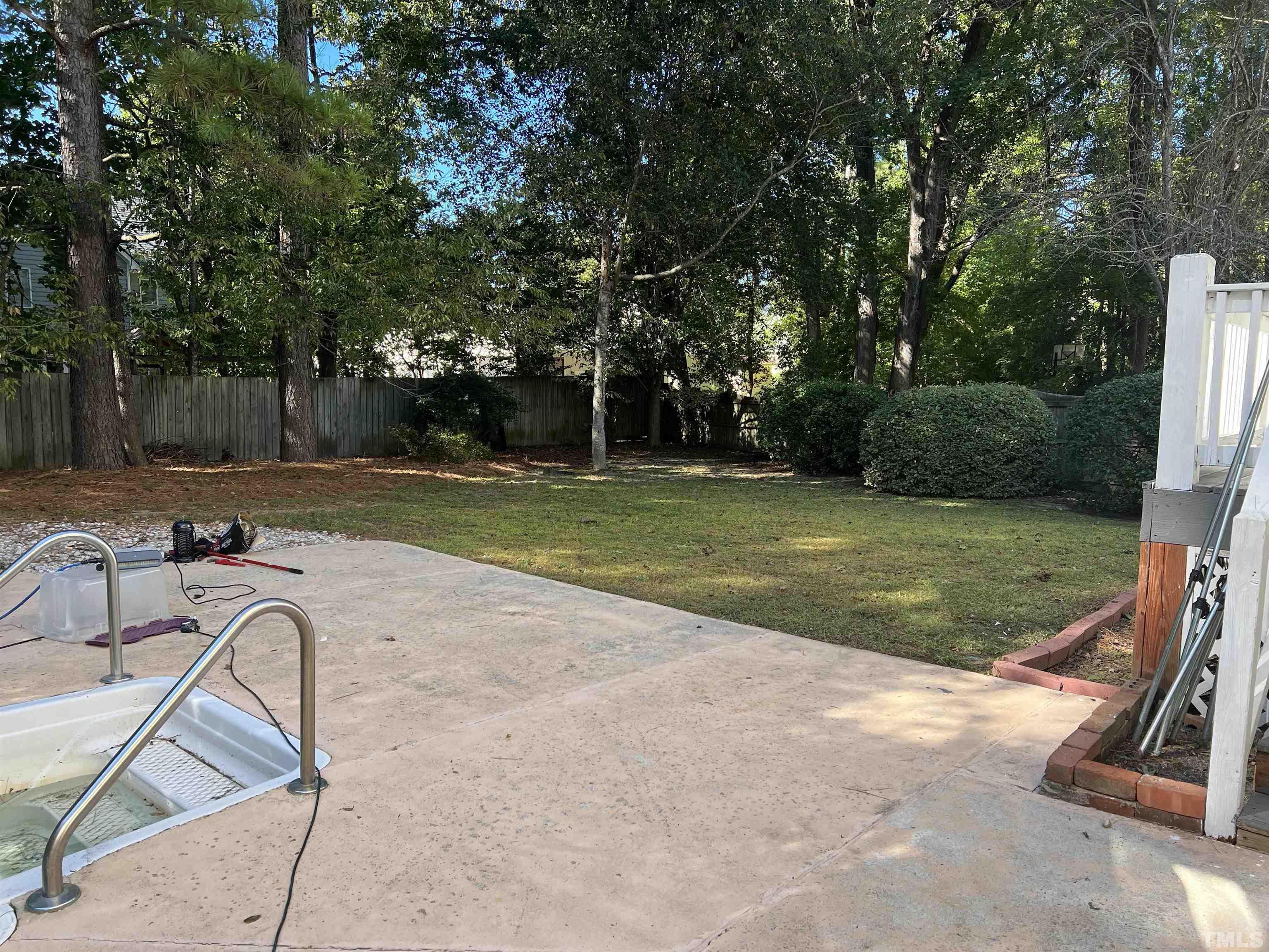 5113 Six Point Trail Raleigh, NC 27616 - Photo 4 of 53 a view of a backyard with swimming pool