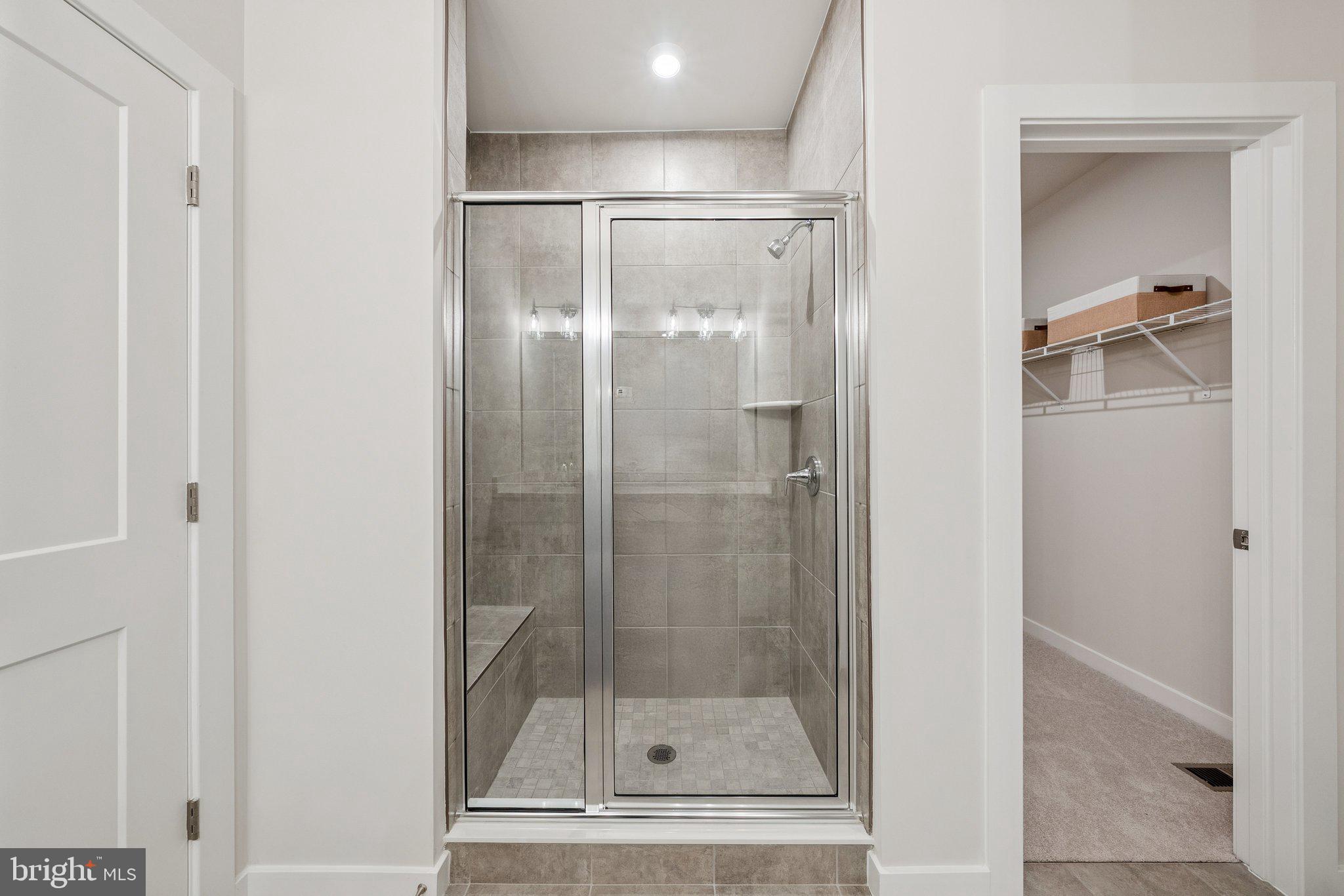 13729 Cobble Loop Woodbridge, VA 22193 - Photo 23 of 28 a bathroom with a shower