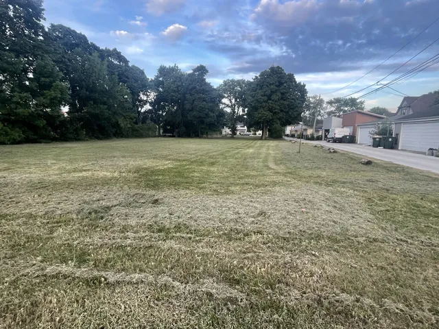 a view of a yard with an outdoor space