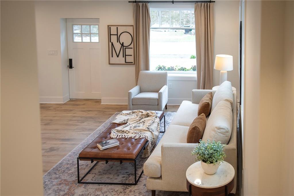 4978 South Pioneer Road Gibsonia, PA 15044 - Photo 14 of 49 a living room with furniture and a large window