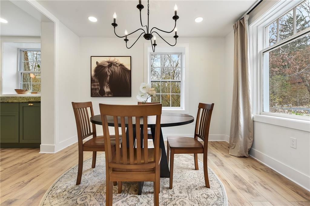 4978 South Pioneer Road Gibsonia, PA 15044 - Photo 29 of 49 a view of a dining room with furniture window and wooden floor