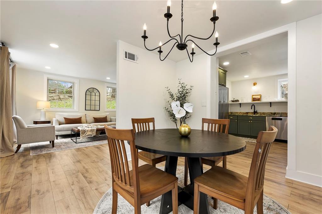 4978 South Pioneer Road Gibsonia, PA 15044 - Photo 30 of 49 a view of a dining room with furniture window and wooden floor