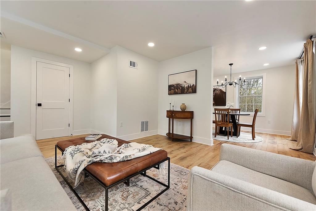 4978 South Pioneer Road Gibsonia, PA 15044 - Photo 5 of 49 a living room with furniture and kitchen view