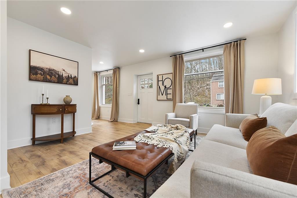 4978 South Pioneer Road Gibsonia, PA 15044 - Photo 6 of 49 a living room with furniture a rug and a window