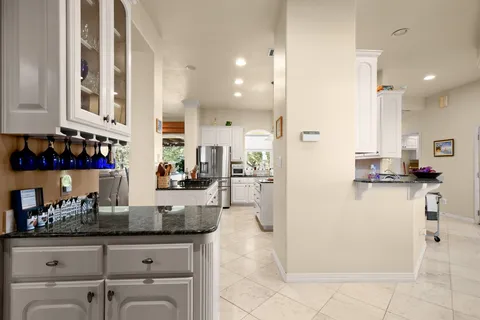 a kitchen with a sink and counter top space