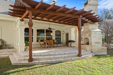 an aerial view of a houses with ocean view