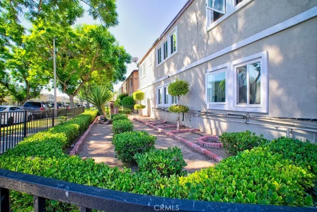 a view of a pathway with a patio