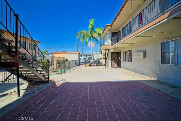 a view of a building with a patio